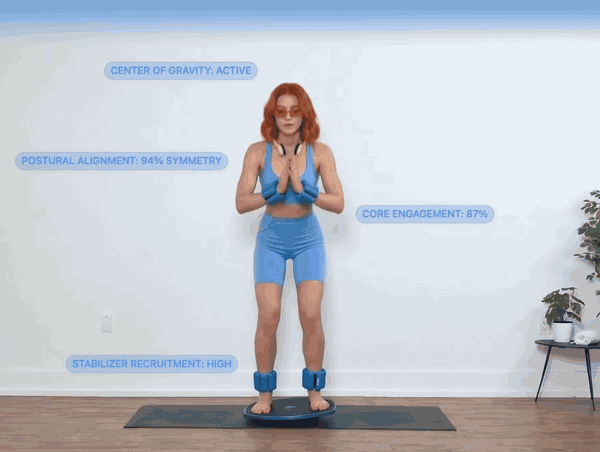 A woman balancing on the GoBalance Sport board while the app reads her posture, core engagement and stabiliser recruitment