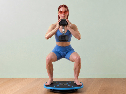 Balance: standing on the board in a squat