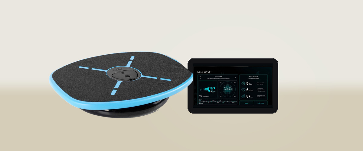 The GoBalance Sport board beside a phone running the app