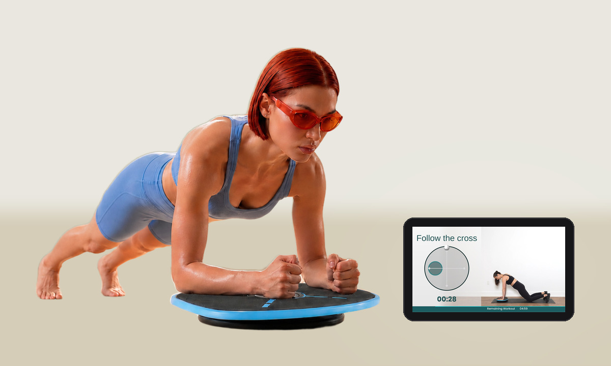 Holding a forearm plank on the board