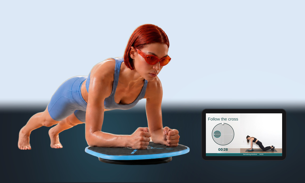 Holding a forearm plank on the board